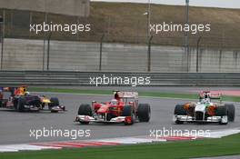 18.04.2010 Shanghai, China,  Fernando Alonso (ESP), Scuderia Ferrari and Adrian Sutil (GER), Force India F1 Team - Formula 1 World Championship, Rd 4, Chinese Grand Prix, Sunday Race