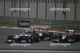 18.04.2010 Shanghai, China,  Rubens Barrichello (BRA), Williams F1 Team and Bruno Senna (BRA), Hispania Racing F1 Team, HRT - Formula 1 World Championship, Rd 4, Chinese Grand Prix, Sunday Race