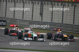 18.04.2010 Shanghai, China,  Adrian Sutil (GER), Force India F1 Team and Sebastian Vettel (GER), Red Bull Racing - Formula 1 World Championship, Rd 4, Chinese Grand Prix, Sunday Race