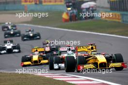 18.04.2010 Shanghai, China,  Robert Kubica (POL), Renault F1 Team, R30 leads Adrian Sutil (GER), Force India F1 Team, VJm-02 - Formula 1 World Championship, Rd 4, Chinese Grand Prix, Sunday Race