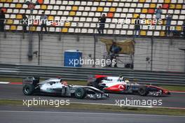 18.04.2010 Shanghai, China,  Lewis Hamilton (GBR), McLaren Mercedes and Michael Schumacher (GER), Mercedes GP Petronas - Formula 1 World Championship, Rd 4, Chinese Grand Prix, Sunday Race