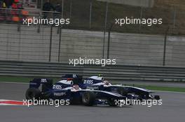 18.04.2010 Shanghai, China,  Rubens Barrichello (BRA), Williams F1 Team and Nico Rosberg (GER), Mercedes GP Petronas - Formula 1 World Championship, Rd 4, Chinese Grand Prix, Sunday Race