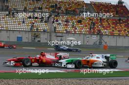 18.04.2010 Shanghai, China,  Fernando Alonso (ESP), Scuderia Ferrari and Adrian Sutil (GER), Force India F1 Team - Formula 1 World Championship, Rd 4, Chinese Grand Prix, Sunday Race