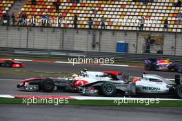 18.04.2010 Shanghai, China,  Lewis Hamilton (GBR), McLaren Mercedes and Michael Schumacher (GER), Mercedes GP Petronas - Formula 1 World Championship, Rd 4, Chinese Grand Prix, Sunday Race