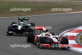 18.04.2010 Shanghai, China,  Lewis Hamilton (GBR), McLaren Mercedes, MP4-25, Heikki Kovalainen (FIN), Lotus F1 Team, T127 - Formula 1 World Championship, Rd 4, Chinese Grand Prix, Sunday Race