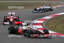 18.04.2010 Shanghai, China,  Lewis Hamilton (GBR), McLaren Mercedes, MP4-25 leads Felipe Massa (BRA), Scuderia Ferrari, F10 - Formula 1 World Championship, Rd 4, Chinese Grand Prix, Sunday Race