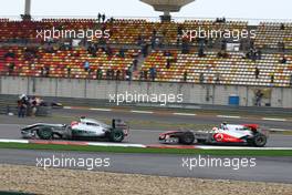 18.04.2010 Shanghai, China,  Lewis Hamilton (GBR), McLaren Mercedes and Michael Schumacher (GER), Mercedes GP Petronas - Formula 1 World Championship, Rd 4, Chinese Grand Prix, Sunday Race