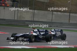 18.04.2010 Shanghai, China,  Rubens Barrichello (BRA), Williams F1 Team and Nico Hulkenberg (GER), Williams F1 Team - Formula 1 World Championship, Rd 4, Chinese Grand Prix, Sunday Race