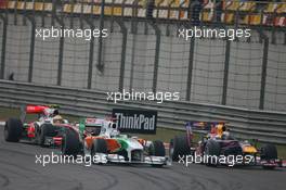 18.04.2010 Shanghai, China,  Adrian Sutil (GER), Force India F1 Team and Sebastian Vettel (GER), Red Bull Racing - Formula 1 World Championship, Rd 4, Chinese Grand Prix, Sunday Race