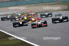 18.04.2010 Shanghai, China,  Jenson Button (GBR), McLaren Mercedes, MP4-25 leads Nico Rosberg (GER), Mercedes GP Petronas, W01 - Formula 1 World Championship, Rd 4, Chinese Grand Prix, Sunday Race