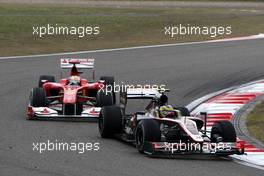 18.04.2010 Shanghai, China,  Bruno Senna (BRA), Hispania Racing F1 Team HRT leads Felipe Massa (BRA), Scuderia Ferrari, F10 - Formula 1 World Championship, Rd 4, Chinese Grand Prix, Sunday Race