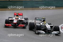18.04.2010 Shanghai, China,  Nico Rosberg (GER), Mercedes GP Petronas, W01 leads Lewis Hamilton (GBR), McLaren Mercedes, MP4-25 - Formula 1 World Championship, Rd 4, Chinese Grand Prix, Sunday Race