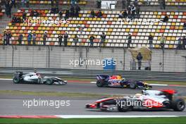 18.04.2010 Shanghai, China,  Sebastian Vettel (GER), Red Bull Racing leads Michael Schumacher (GER), Mercedes GP Petronas, W01 - Formula 1 World Championship, Rd 4, Chinese Grand Prix, Sunday Race
