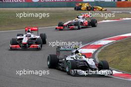 18.04.2010 Shanghai, China,  Nico Rosberg (GER), Mercedes GP Petronas, W01 leads Jenson Button (GBR), McLaren Mercedes, MP4-25 - Formula 1 World Championship, Rd 4, Chinese Grand Prix, Sunday Race