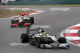 18.04.2010 Shanghai, China,  Nico Rosberg (GER), Mercedes GP Petronas, W01 leads Lewis Hamilton (GBR), McLaren Mercedes, MP4-25 - Formula 1 World Championship, Rd 4, Chinese Grand Prix, Sunday Race