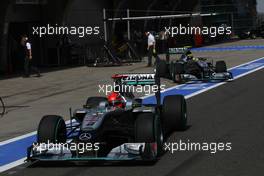 17.04.2010 Shanghai, China,  Michael Schumacher (GER), Mercedes GP Petronas, W01 leads Nico Rosberg (GER), Mercedes GP Petronas, W01 - Formula 1 World Championship, Rd 4, Chinese Grand Prix, Saturday Qualifying