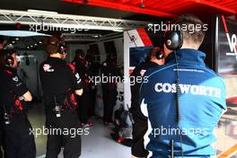 07.05.2010 Barcelona, Spain,  A Cosworth Engineer looks into the Virgin garage - Formula 1 World Championship, Rd 5, Spanish Grand Prix, Friday Practice