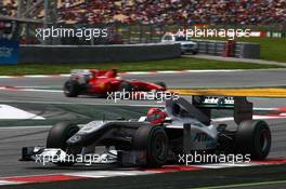09.05.2010 Barcelona, Spain,  Michael Schumacher (GER), Mercedes GP Petronas, W01 leads Felipe Massa (BRA), Scuderia Ferrari - Formula 1 World Championship, Rd 5, Spanish Grand Prix, Sunday Race