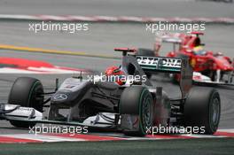 09.05.2010 Barcelona, Spain,  Michael Schumacher (GER), Mercedes GP Petronas leads Felipe Massa (BRA), Scuderia Ferrari - Formula 1 World Championship, Rd 5, Spanish Grand Prix, Sunday Race