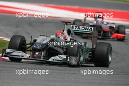 09.05.2010 Barcelona, Spain,  Michael Schumacher (GER), Mercedes GP Petronas leads Jenson Button (GBR), McLaren Mercedes - Formula 1 World Championship, Rd 5, Spanish Grand Prix, Sunday Race