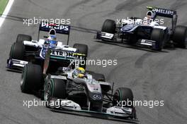 09.05.2010 Barcelona, Spain,  Nico Rosberg (GER), Mercedes GP Petronas, W01 leads Rubens Barrichello (BRA), Williams F1 Team, FW32 and Nico Rosberg (GER), Mercedes GP Petronas, W01 - Formula 1 World Championship, Rd 5, Spanish Grand Prix, Sunday Race