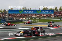 09.05.2010 Barcelona, Spain,  Mark Webber (AUS), Red Bull Racing leads the start of the race - Formula 1 World Championship, Rd 5, Spanish Grand Prix, Sunday Race