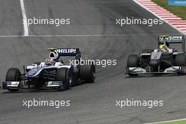 09.05.2010 Barcelona, Spain,  Nico Hulkenberg (GER), Williams F1 Team and Nico Rosberg (GER), Mercedes GP  - Formula 1 World Championship, Rd 5, Spanish Grand Prix, Sunday Race