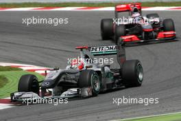 09.05.2010 Barcelona, Spain,  Michael Schumacher (GER), Mercedes GP and Jenson Button (GBR), McLaren Mercedes  - Formula 1 World Championship, Rd 5, Spanish Grand Prix, Sunday Race