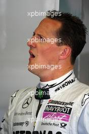 25.06.2010 Valencia, Spain,  Michael Schumacher (GER), Mercedes GP Petronas, yawning - Formula 1 World Championship, Rd 9, European Grand Prix, Friday Practice