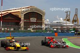 25.06.2010 Valencia, Spain,  Vitaly Petrov (RUS), Renault F1 Team and Lucas di Grassi (BRA), Virgin Racing  - Formula 1 World Championship, Rd 9, European Grand Prix, Friday Practice