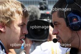 27.06.2010 Valencia, Spain,  Sebastian Vettel (GER), Red Bull Racing talks with Guillaume Rocquelin his engineer - Formula 1 World Championship, Rd 9, European Grand Prix, Sunday Pre-Race Grid