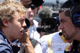 27.06.2010 Valencia, Spain,  Sebastian Vettel (GER), Red Bull Racing talks with Guillaume Rocquelin - Formula 1 World Championship, Rd 9, European Grand Prix, Sunday Pre-Race Grid