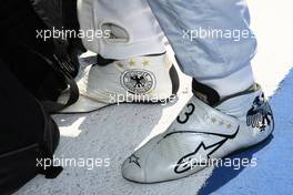 27.06.2010 Valencia, Spain,  The boots of Michael Schumacher (GER), Mercedes GP Petronas - Formula 1 World Championship, Rd 9, European Grand Prix, Sunday Pre-Race Grid