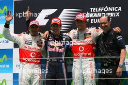 27.06.2010 Valencia, Spain,  Lewis Hamilton (GBR), McLaren Mercedes with 1st place Sebastian Vettel (GER), Red Bull Racing and 3rd place Jenson Button (GBR), McLaren Mercedes - Formula 1 World Championship, Rd 9, European Grand Prix, Sunday Podium