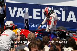 27.06.2010 Valencia, Spain,  Lewis Hamilton (GBR), McLaren Mercedes and Jenson Button (GBR), McLaren Mercedes take a look at the Red Bull Racing - Formula 1 World Championship, Rd 9, European Grand Prix, Sunday Podium