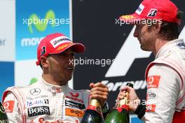 27.06.2010 Valencia, Spain,  Lewis Hamilton (GBR), McLaren Mercedes, Jenson Button (GBR), McLaren Mercedes - Formula 1 World Championship, Rd 9, European Grand Prix, Sunday Podium