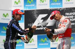 27.06.2010 Valencia, Spain,  Sebastian Vettel (GER), Red Bull Racing and Lewis Hamilton (GBR), McLaren Mercedes - Formula 1 World Championship, Rd 9, European Grand Prix, Sunday Podium