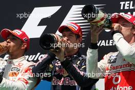 27.06.2010 Valencia, Spain,  Lewis Hamilton (GBR), McLaren Mercedes with 1st place Sebastian Vettel (GER), Red Bull Racing and 3rd place Jenson Button (GBR), McLaren Mercedes - Formula 1 World Championship, Rd 9, European Grand Prix, Sunday Podium