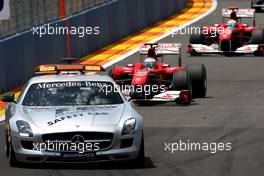 27.06.2010 Valencia, Spain,  The safety car leads Fernando Alonso (ESP), Scuderia Ferrari - Formula 1 World Championship, Rd 9, European Grand Prix, Sunday Race