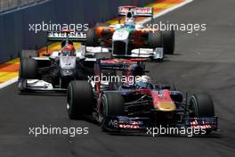 27.06.2010 Valencia, Spain,  Sébastien Buemi (SUI), Scuderia Toro Rosso leads Michael Schumacher (GER), Mercedes GP Petronas - Formula 1 World Championship, Rd 9, European Grand Prix, Sunday Race