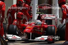 27.06.2010 Valencia, Spain,  Fernando Alonso (ESP), Scuderia Ferrari  pit stop - Formula 1 World Championship, Rd 9, European Grand Prix, Sunday Race