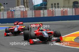 27.06.2010 Valencia, Spain,  Lucas di Grassi (BRA), Virgin Racing leads Timo Glock (GER), Virgin Racing - Formula 1 World Championship, Rd 9, European Grand Prix, Sunday Race