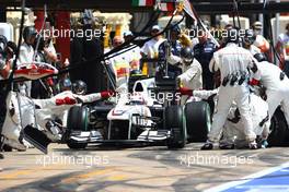 27.06.2010 Valencia, Spain,  Kamui Kobayashi (JAP), BMW Sauber F1 Team makes his pit stop - Formula 1 World Championship, Rd 9, European Grand Prix, Sunday Race