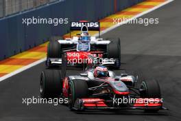 27.06.2010 Valencia, Spain,  Jenson Button (GBR), McLaren Mercedes leads Rubens Barrichello (BRA), Williams F1 Team - Formula 1 World Championship, Rd 9, European Grand Prix, Sunday Race