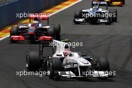 27.06.2010 Valencia, Spain,  Kamui Kobayashi (JAP), BMW Sauber F1 Team leads Jenson Button (GBR), McLaren Mercedes - Formula 1 World Championship, Rd 9, European Grand Prix, Sunday Race