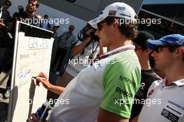27.06.2010 Valencia, Spain,  Adrian Sutil (GER), Force India F1 Team, The drivers predict the score for the England v Germany football match - Formula 1 World Championship, Rd 9, European Grand Prix, Sunday