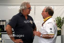 27.06.2010 Valencia, Spain,  Flavio Briatore (ITA), Jean-Francois Caubet (FRA), Managing director of Renault F1 - Formula 1 World Championship, Rd 9, European Grand Prix, Sunday