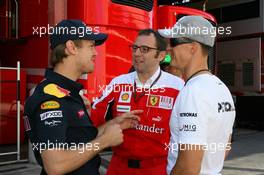 24.06.2010 Valencia, Spain,  Sebastian Vettel (GER), Red Bull Racing with Stefano Domenicali (ITA) Ferrari General Director and Michael Schumacher (GER), Mercedes GP Petronas - Formula 1 World Championship, Rd 9, European Grand Prix, Thursday