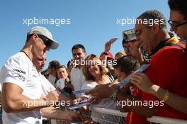 24.06.2010 Valencia, Spain,  Michael Schumacher (GER), Mercedes GP Petronas signs autographs - Formula 1 World Championship, Rd 9, European Grand Prix, Thursday