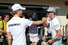 24.06.2010 Valencia, Spain,  Nico Rosberg (GER), Mercedes GP Petronas and Michael Schumacher (GER), Mercedes GP Petronas play table football - Formula 1 World Championship, Rd 9, European Grand Prix, Thursday